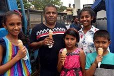 Saturday May 5th 2018, DVA's Sri Lanka project hosted a vegan icecream social on the streets of Colombo, Sri Lanka and gave out two thousands frozen soy cones. Here is a happy family enjoying the food on a hot day.